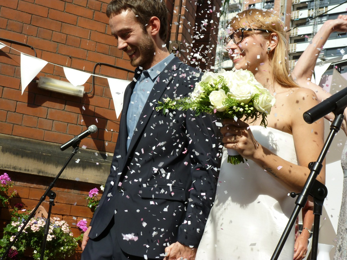 Jamie and Camila in confetti