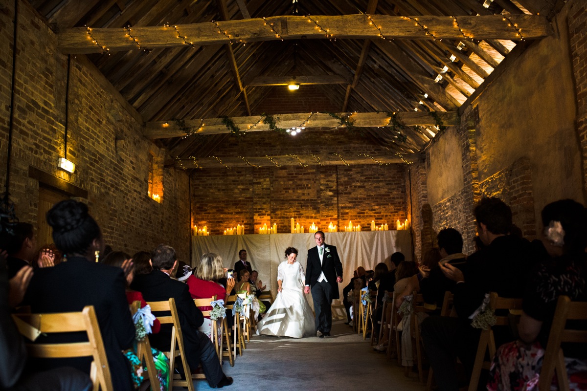 Bride and groom processing out of their wedding ceremony